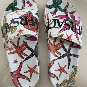Versace Trésor De La Mer print slides